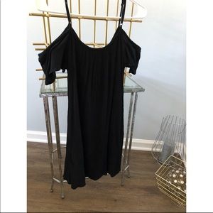 Black cold shoulder dress.